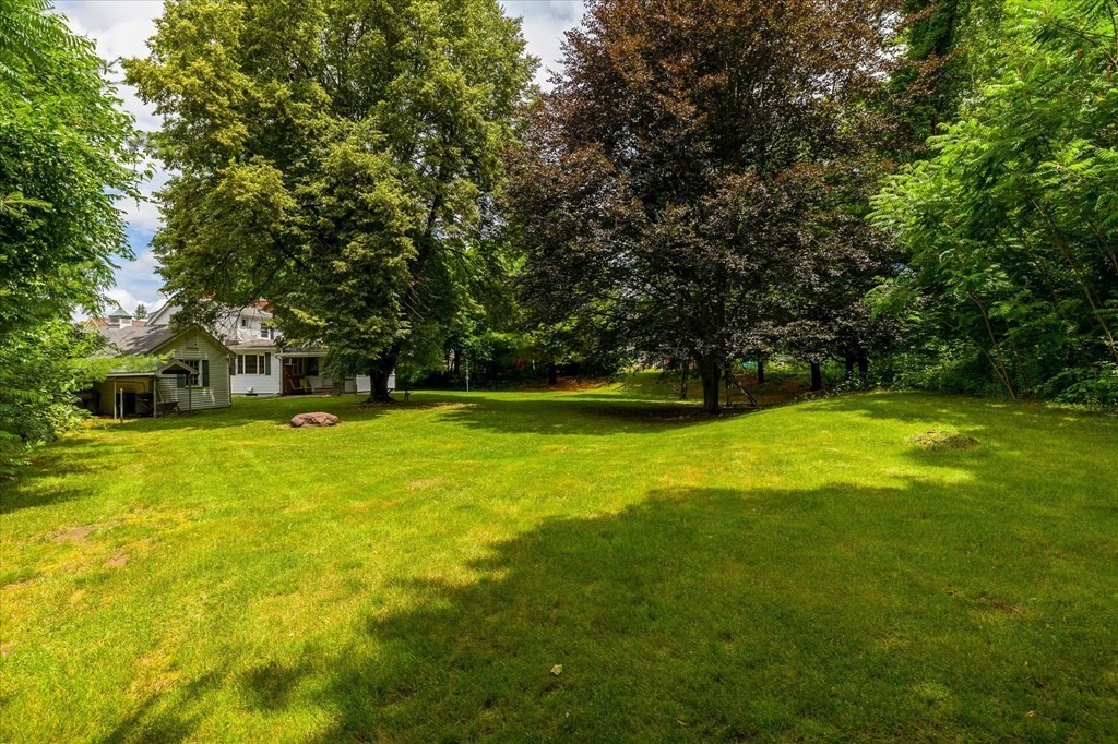 23 Fay Street Chicopee, MA 01020 - Photo 29 of 32 a view of a swimming pool with a yard