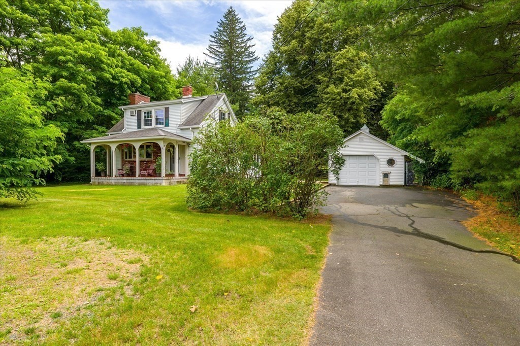 23 Fay Street Chicopee, MA 01020 - Photo 3 of 32 a house view with a garden space