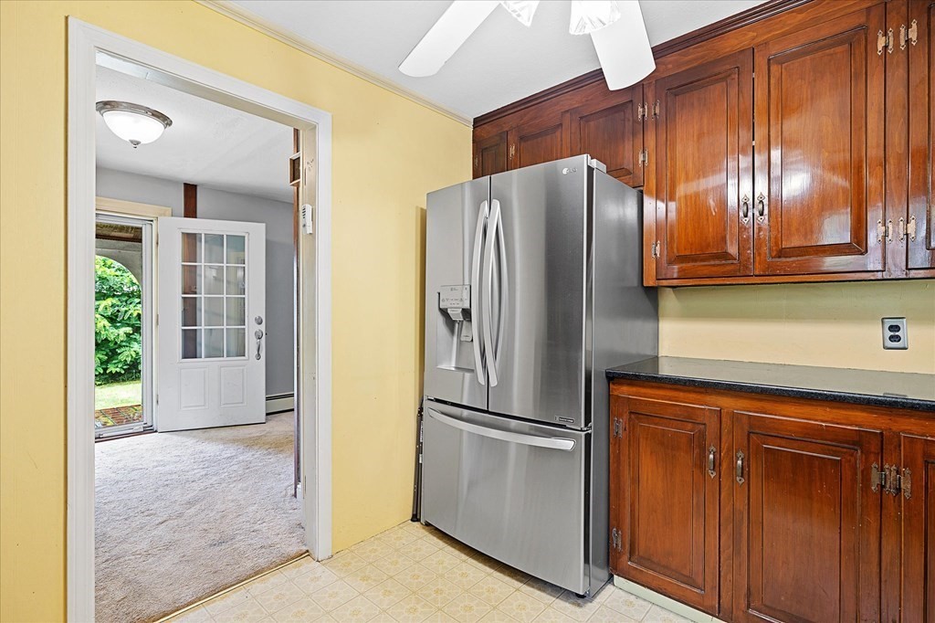 23 Fay Street Chicopee, MA 01020 - Photo 10 of 32 a kitchen with stainless steel appliances granite countertop a refrigerator and a sink