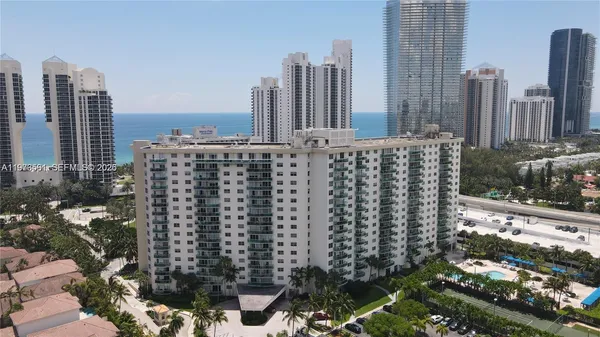 a view of a city with tall buildings
