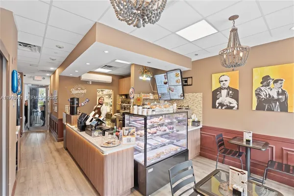 a view of a living room and dining room