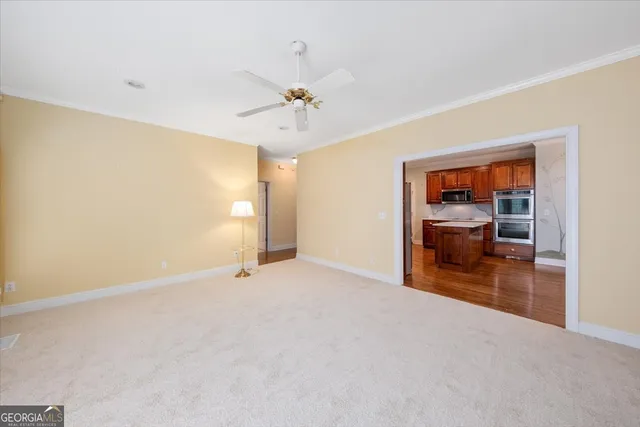 a view of a hallway with staircase