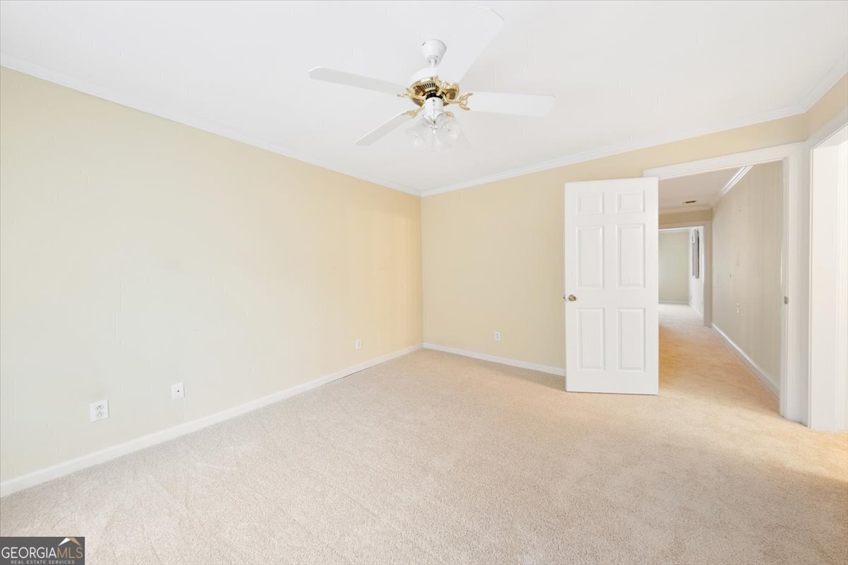 112 Covington Place Macon, GA 31210 - Photo 35 of 76 a view of a room with a ceiling fan and a window