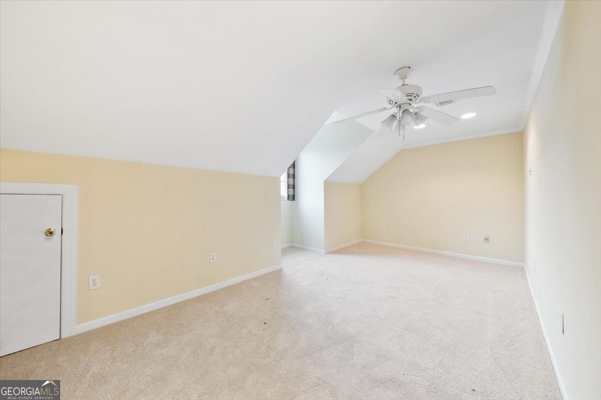 112 Covington Place Macon, GA 31210 - Photo 42 of 76 an empty room with a ceiling fan and a window