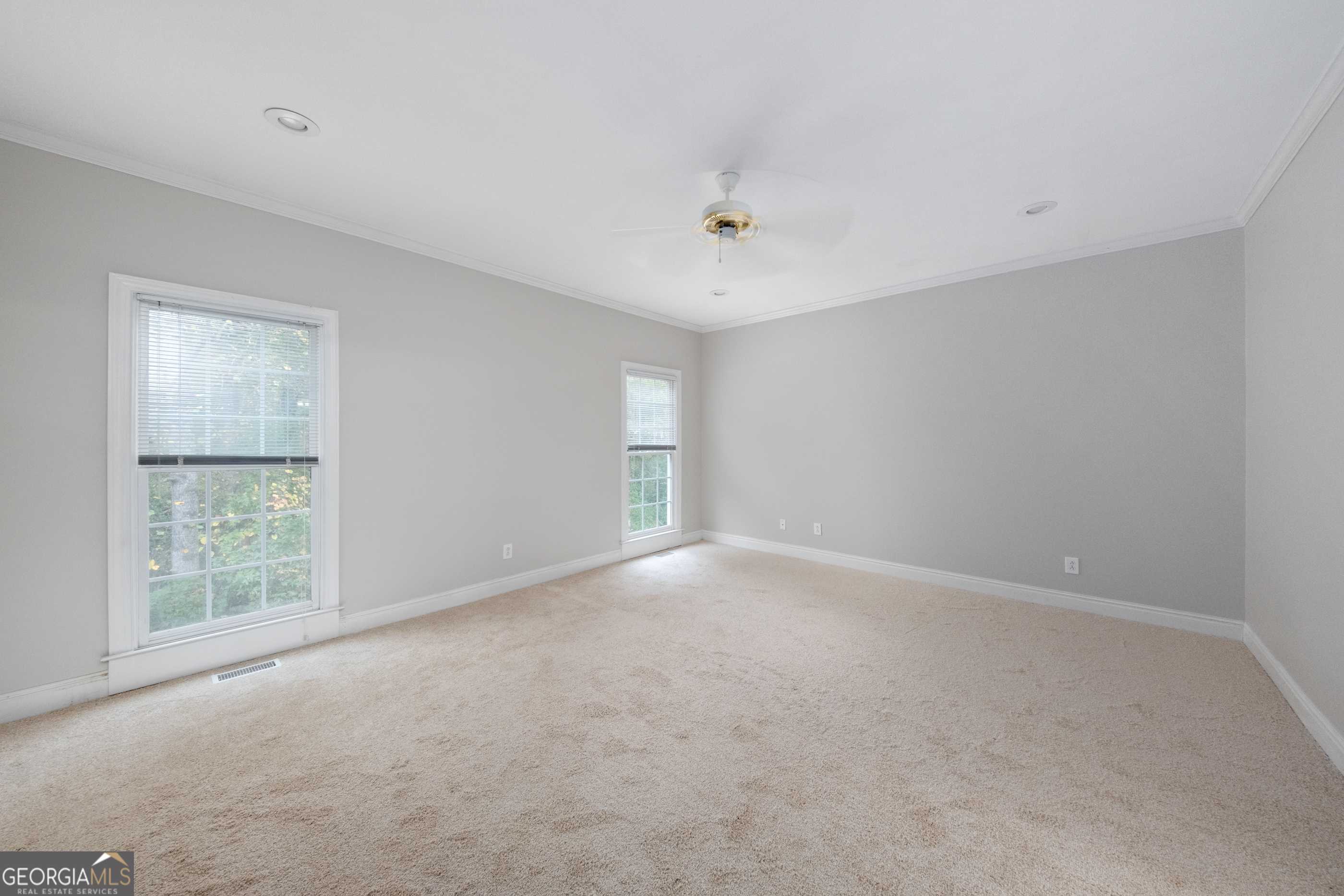 112 Covington Place Macon, GA 31210 - Photo 7 of 76 an empty room with a empty space and windows