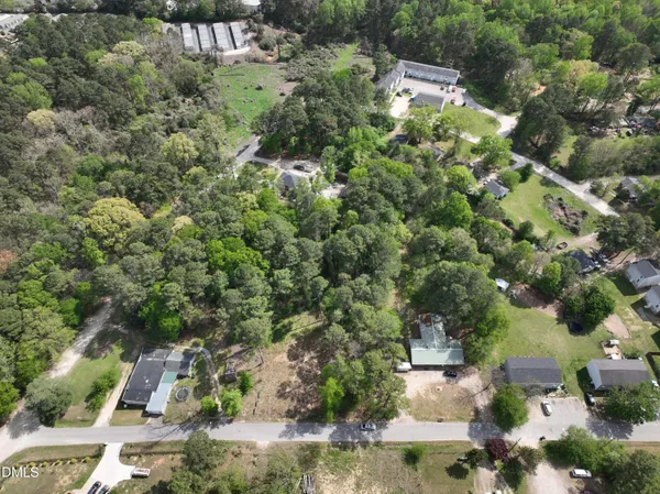 an aerial view of residential house with outdoor space
