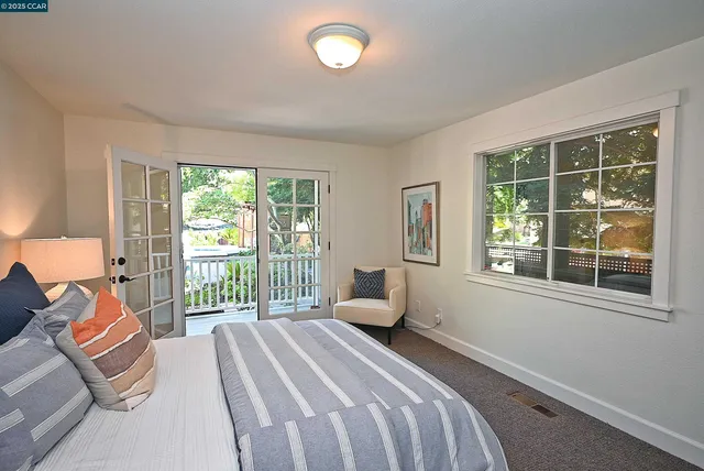 a bathroom with a sink a mirror and a vanity