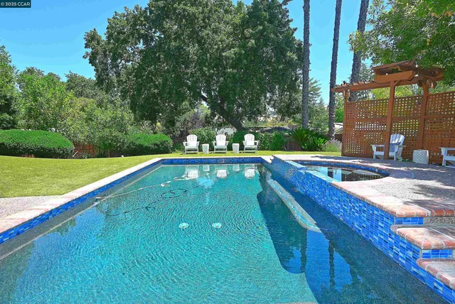 a view of yard with patio