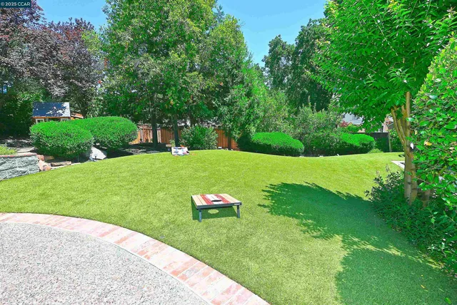 a view of swimming pool from a lounge chair