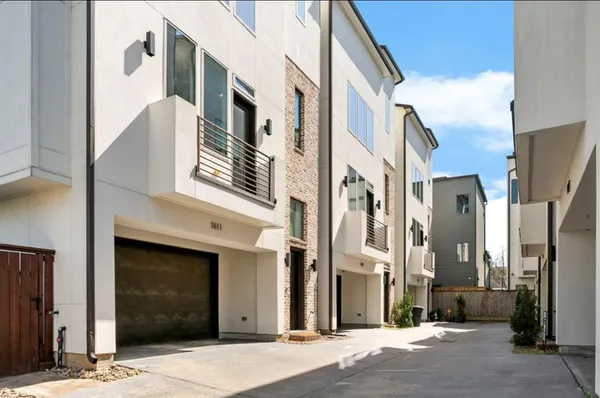 a view of a building along the street