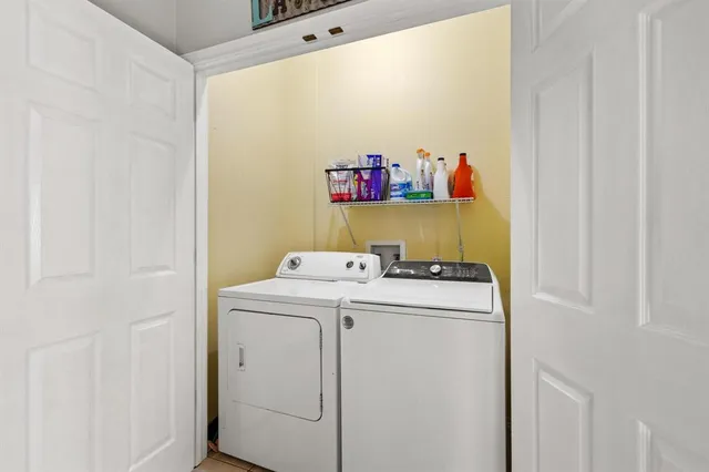 a utility room with dryer and washer
