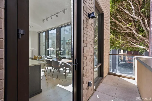 a kitchen with stainless steel appliances granite countertop a stove and a refrigerator