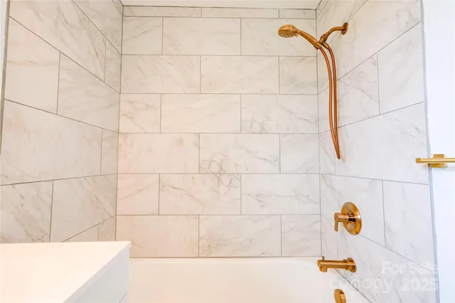 a bathroom with a sink and window