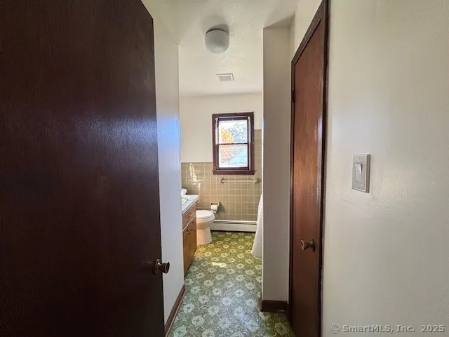 a bathroom with a toilet