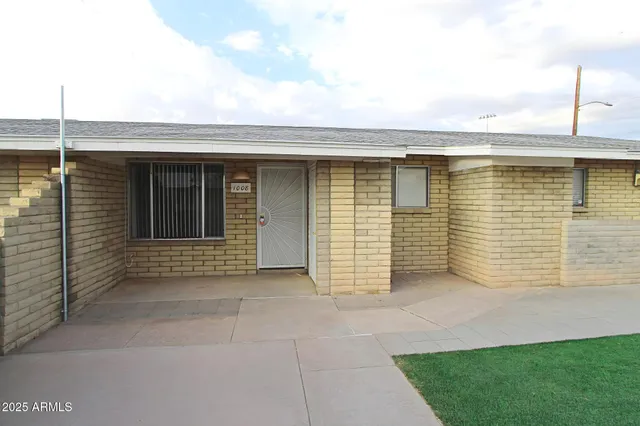 a view of a terrace with yard