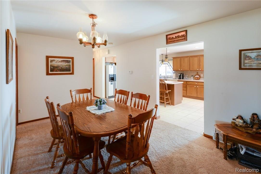 5821 West Hayner Road Fowlerville, MI 48836 - Photo 8 of 21 Large formal dining room off kitchen