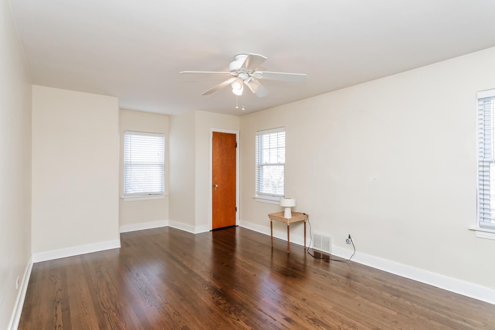 552 East Parkway Road Riverside, IL 60546 - Photo 17 of 25 a view of an empty room with window and wooden floor