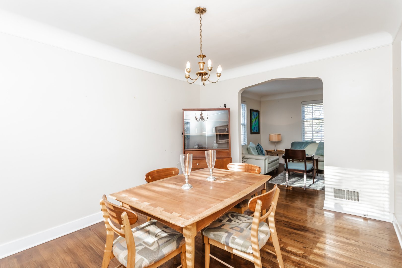 552 East Parkway Road Riverside, IL 60546 - Photo 9 of 25 a view of a dining room with furniture and wooden floor