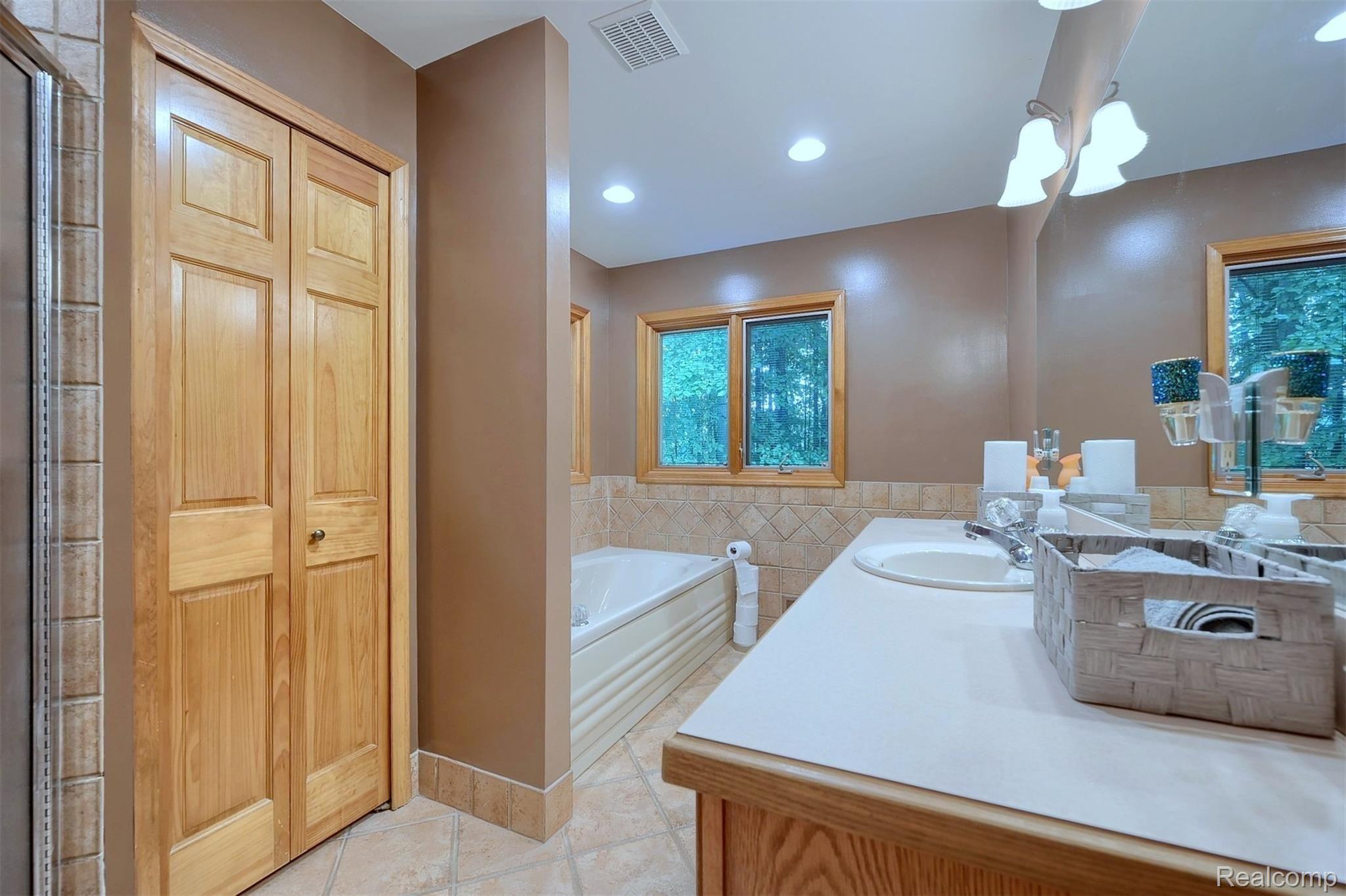 4781 Havens Road Leonard, MI 48367 - Photo 23 of 45 23-Master-Bathroom-2nd-View.jpg