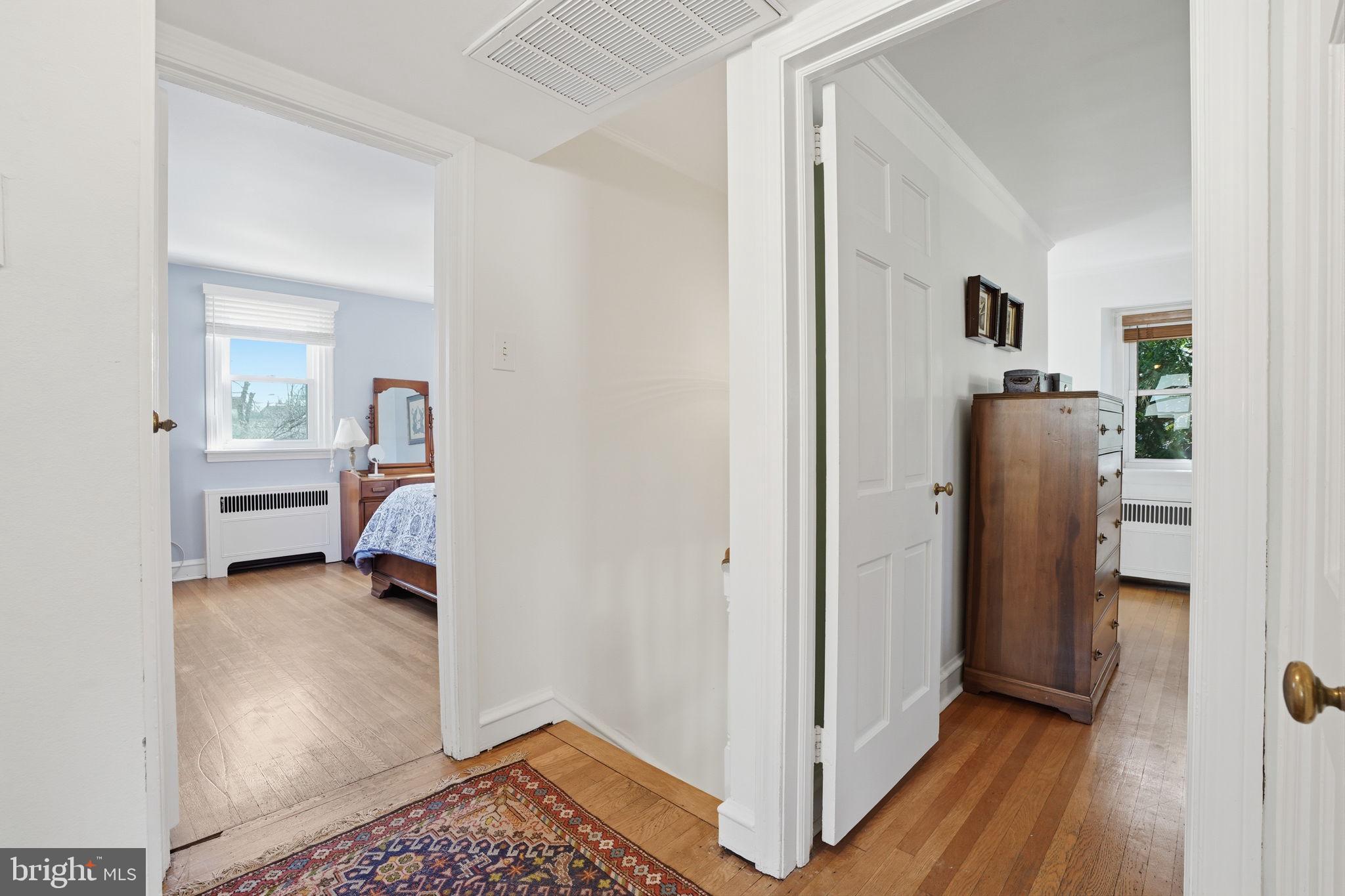 7791 Spring Avenue Elkins Park, PA 19027 - Photo 14 of 33 a view of a bedroom with closet and mirror