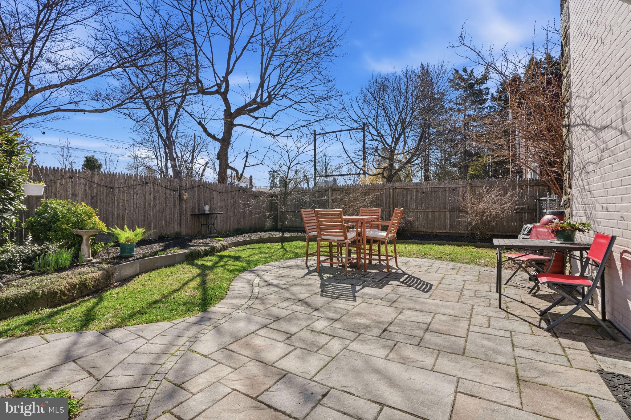 7791 Spring Avenue Elkins Park, PA 19027 - Photo 26 of 33 a view of a chairs and table in backyard of the house