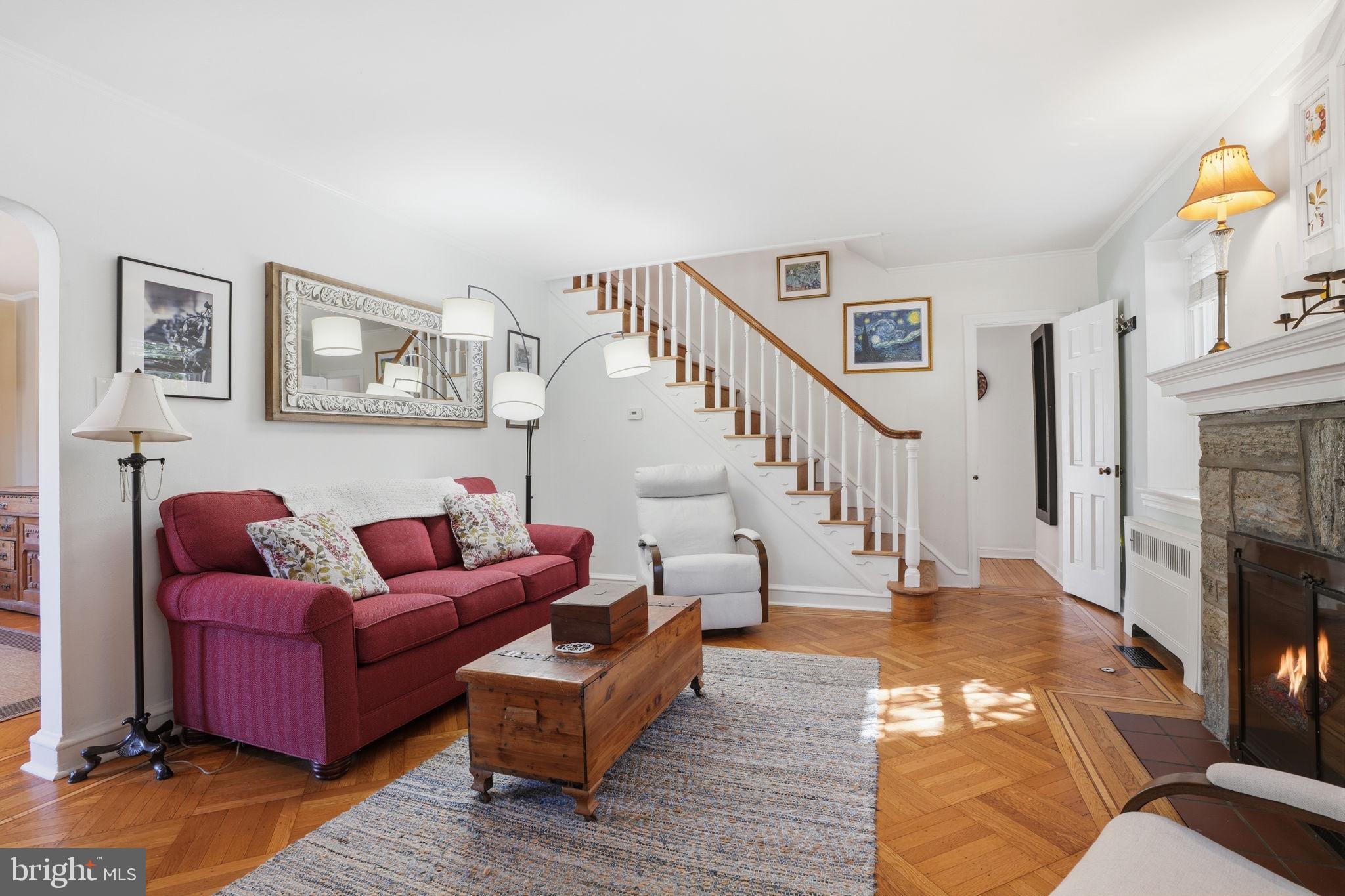7791 Spring Avenue Elkins Park, PA 19027 - Photo 3 of 33 a living room with furniture and a fireplace