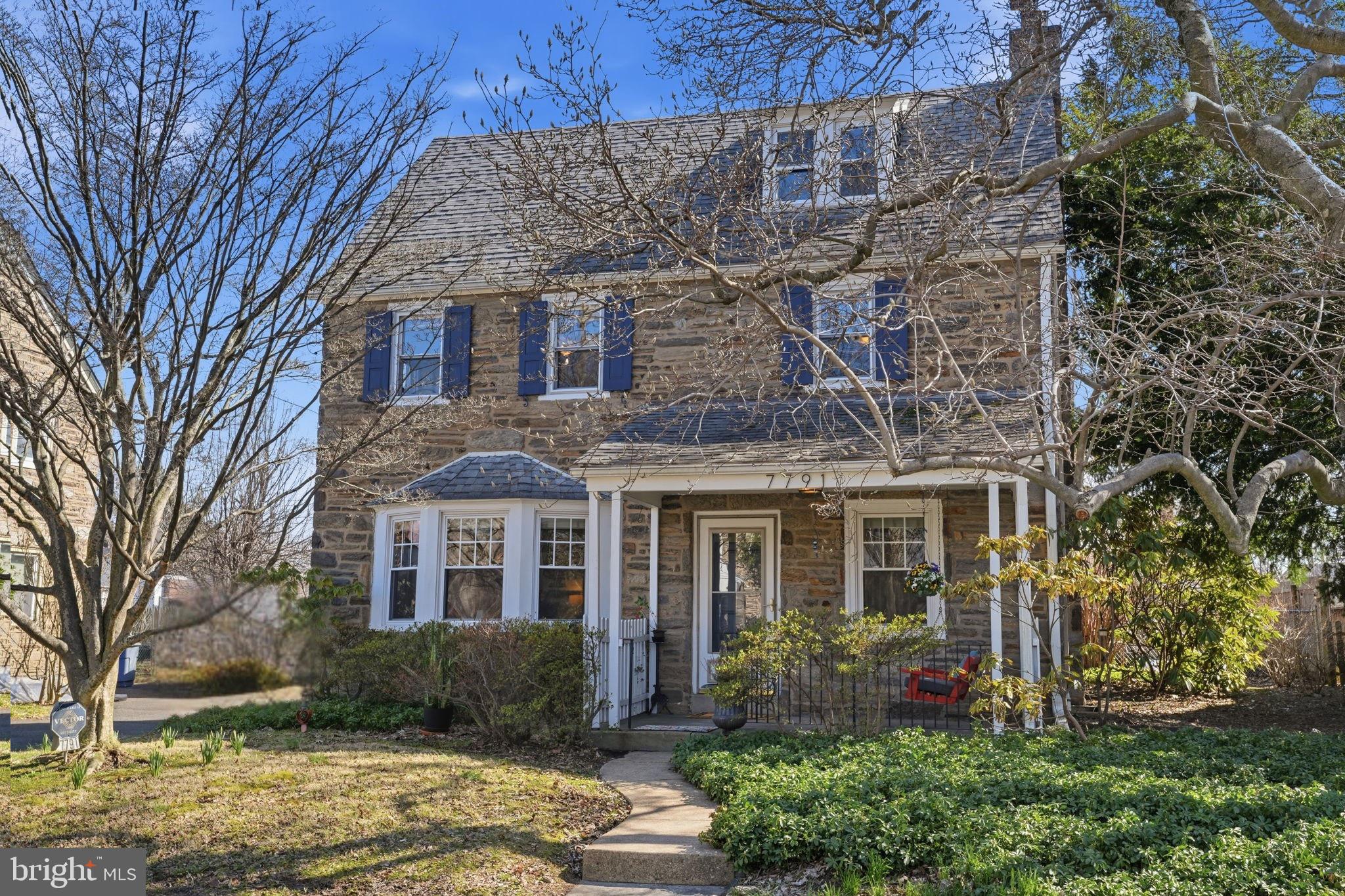 7791 Spring Avenue Elkins Park, PA 19027 - Photo 33 of 33 a front view of a house with garden
