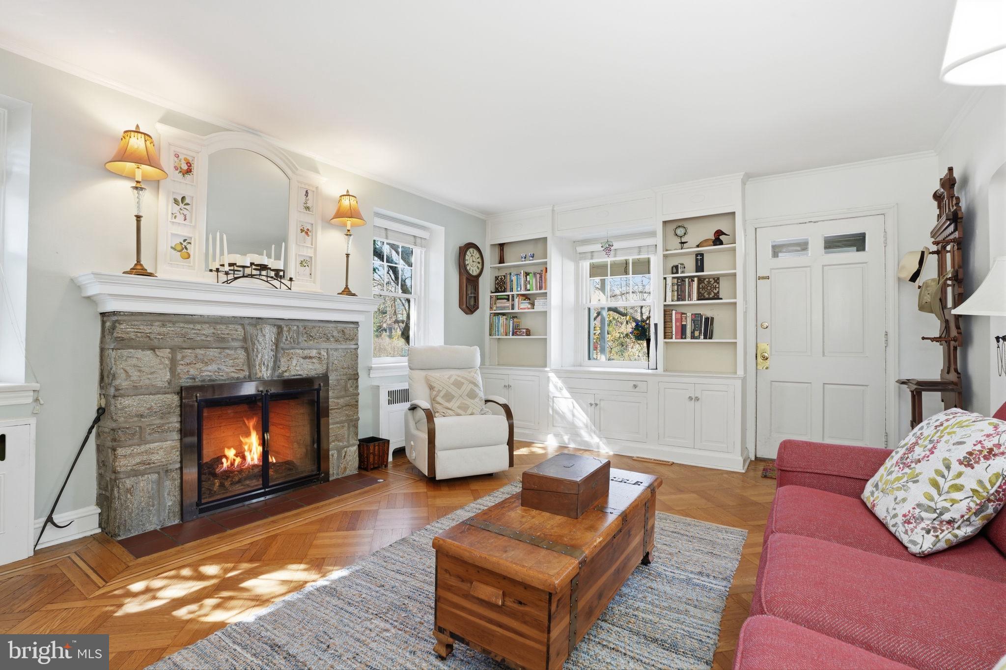 7791 Spring Avenue Elkins Park, PA 19027 - Photo 4 of 33 a living room with furniture and a fireplace