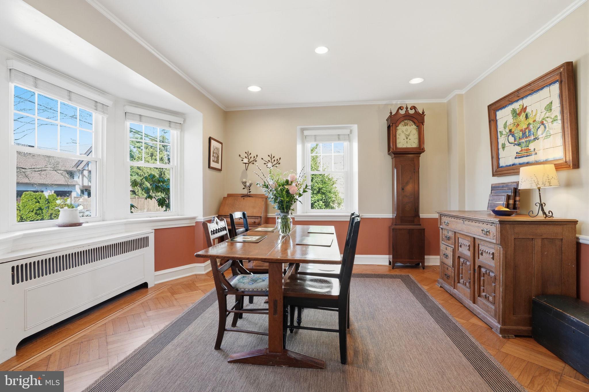 7791 Spring Avenue Elkins Park, PA 19027 - Photo 5 of 33 a view of a dining room with furniture a couch and wooden floor
