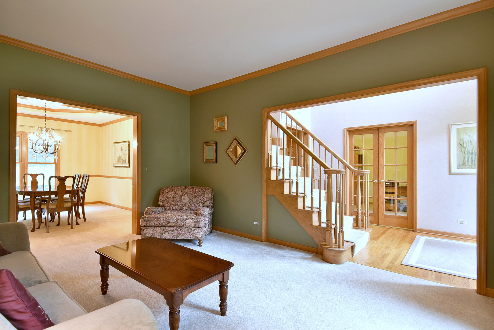 448 Lewis Road Geneva, IL 60134 - Photo 14 of 52 a living room with furniture and a floor to ceiling window