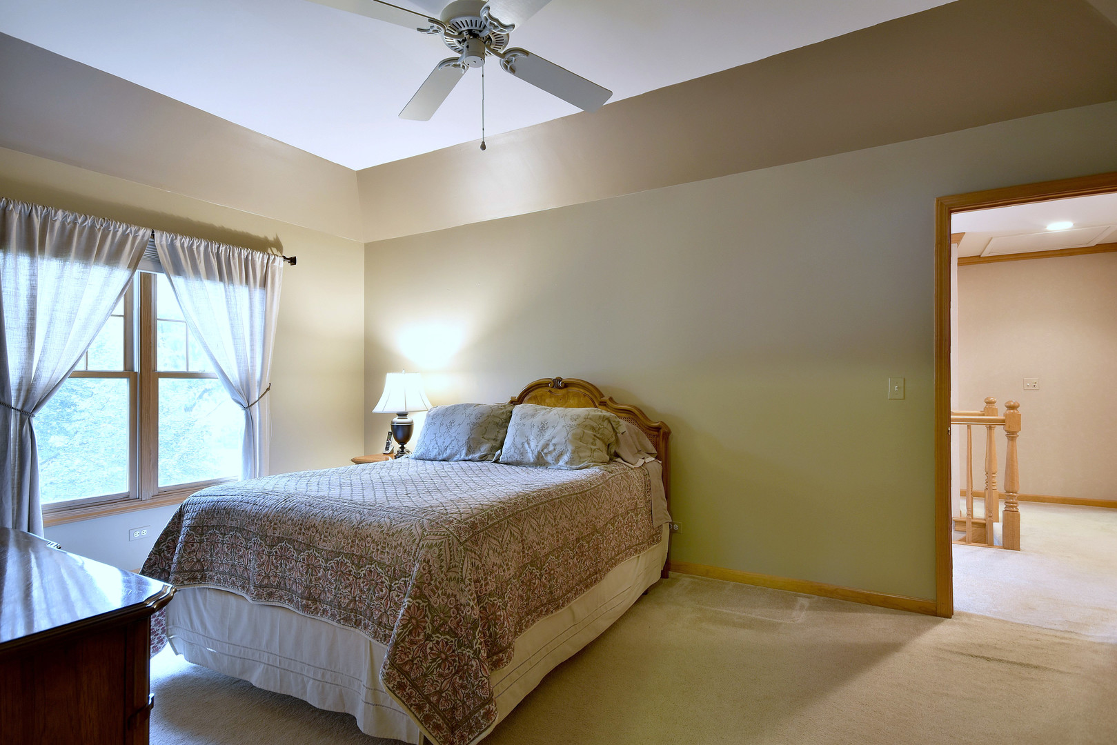 448 Lewis Road Geneva, IL 60134 - Photo 22 of 52 a bedroom with a bed and a window