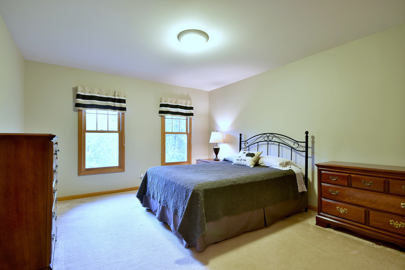 448 Lewis Road Geneva, IL 60134 - Photo 28 of 52 a bedroom with a bed and a window