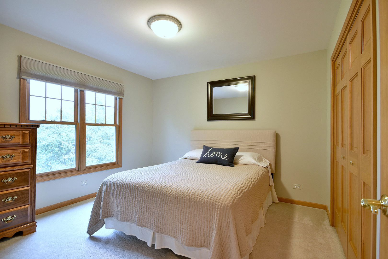 448 Lewis Road Geneva, IL 60134 - Photo 32 of 52 a bedroom with a bed and a window