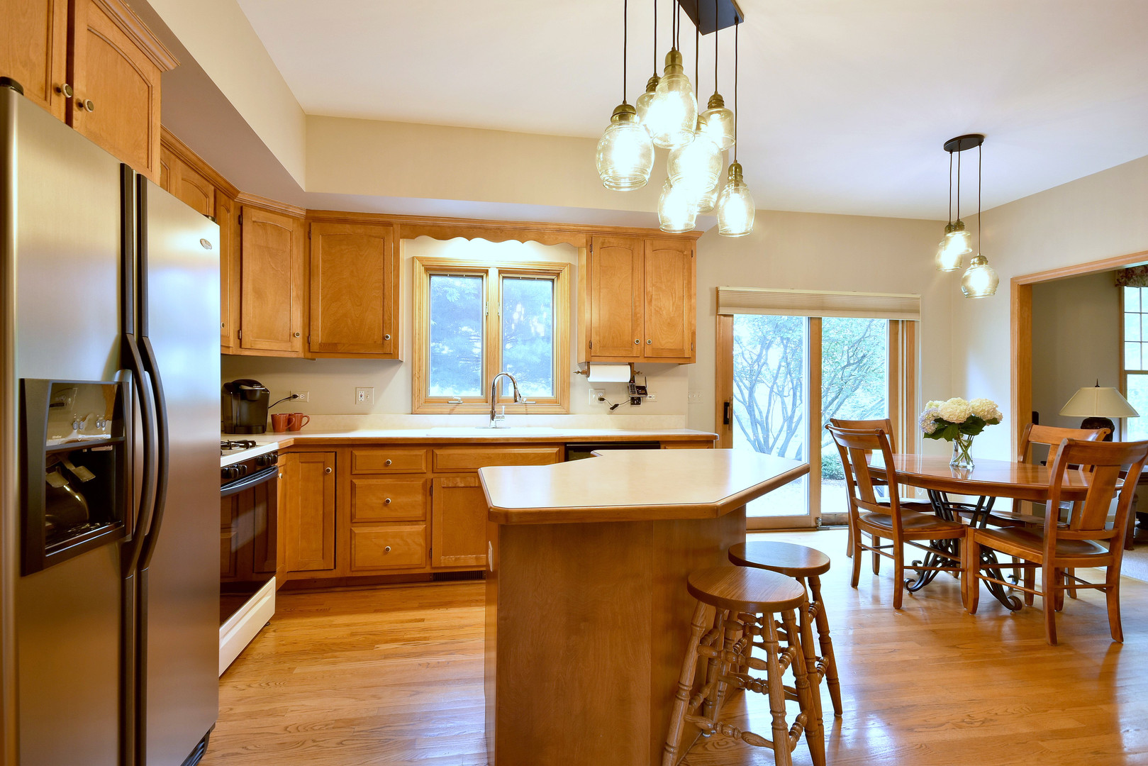 448 Lewis Road Geneva, IL 60134 - Photo 5 of 52 a large kitchen with lots of counter space a sink and appliances