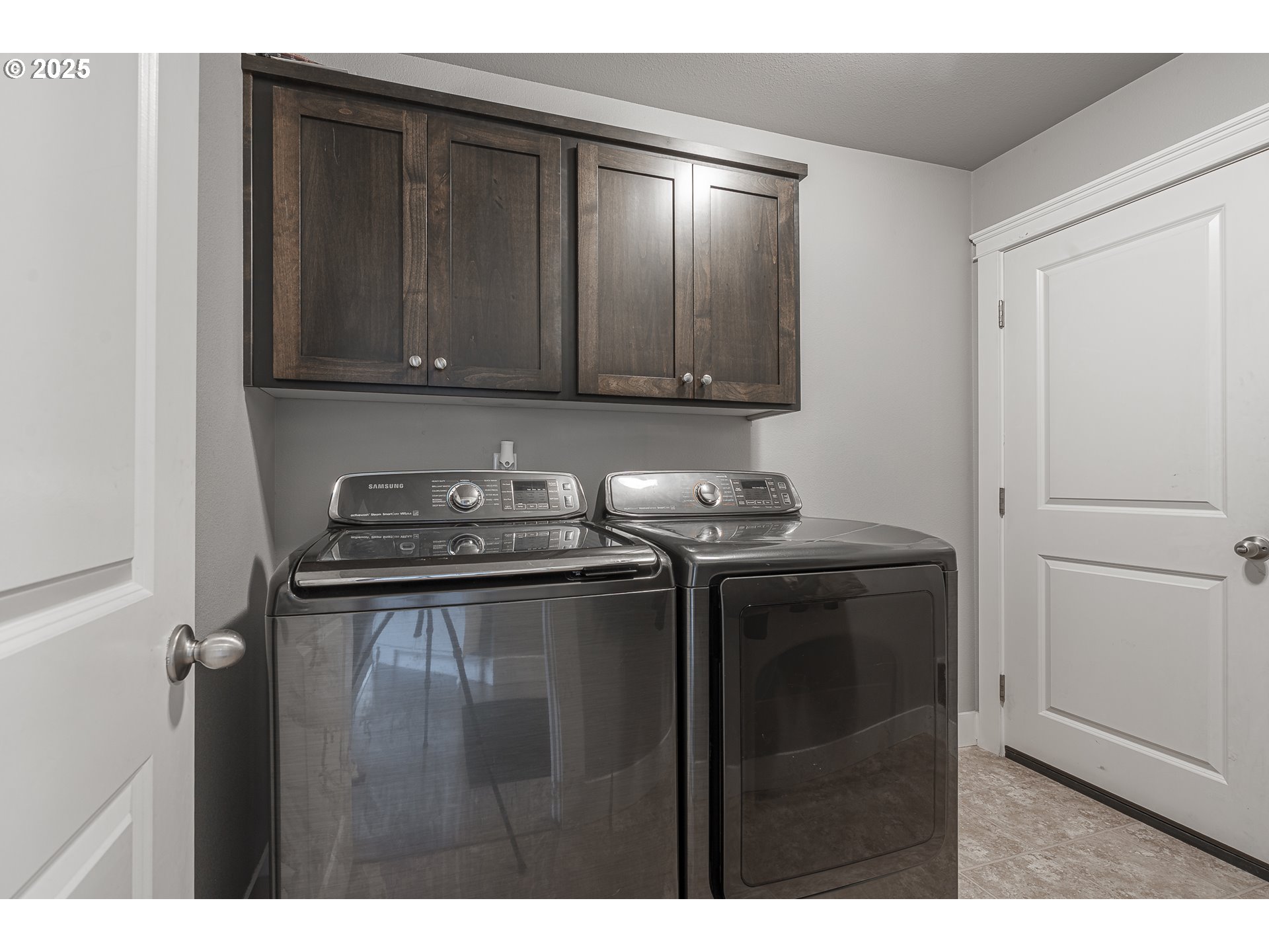 2474 Equestrian Loop South Salem, OR 97302 - Photo 17 of 23 a kitchen with a refrigerator and cabinets