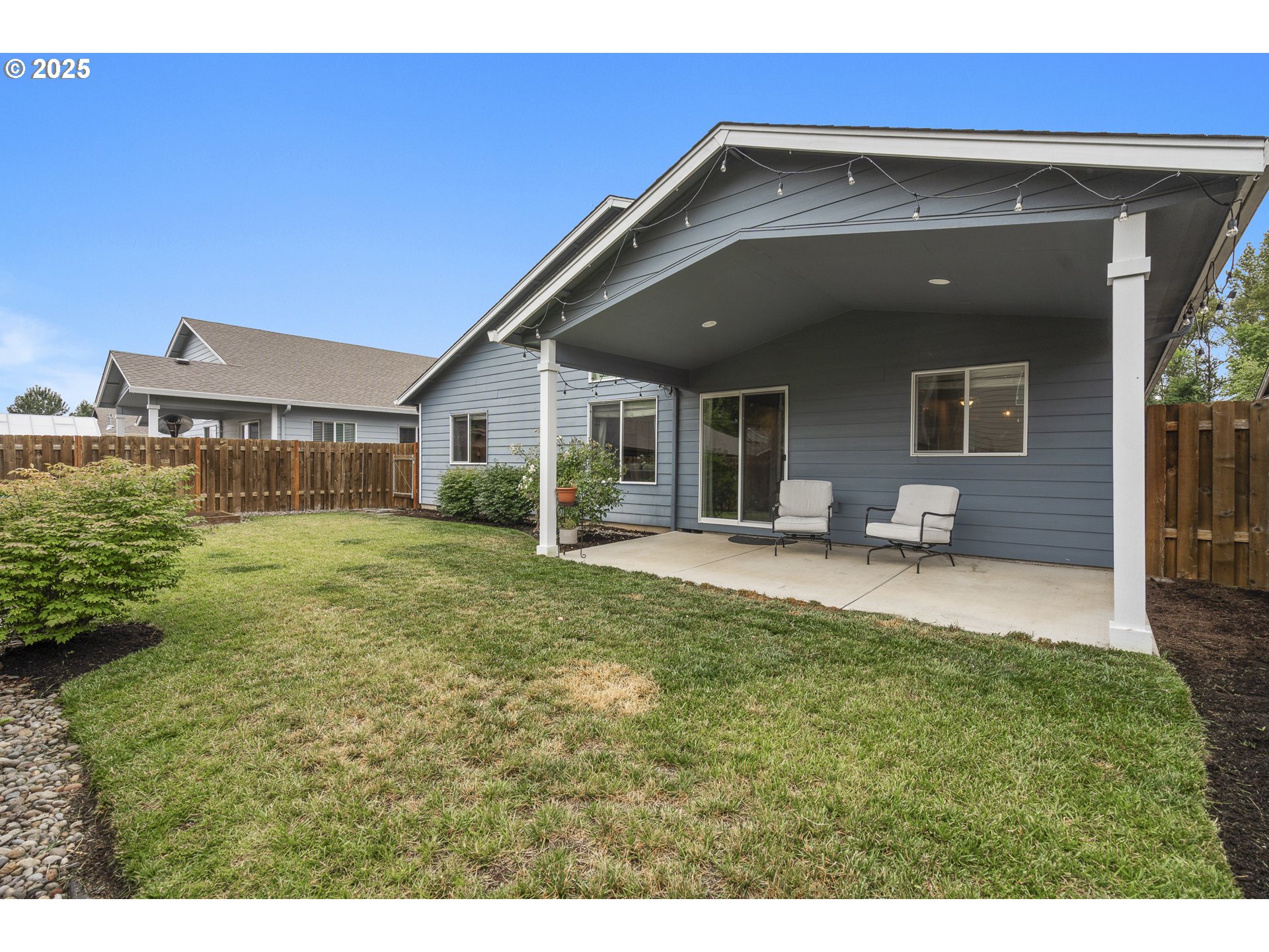 2474 Equestrian Loop South Salem, OR 97302 - Photo 19 of 23 a swimming pool with outdoor seating and yard