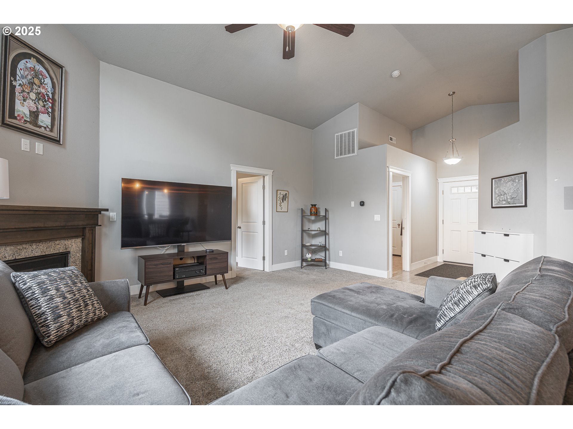 2474 Equestrian Loop South Salem, OR 97302 - Photo 7 of 23 a living room with furniture and a flat screen tv