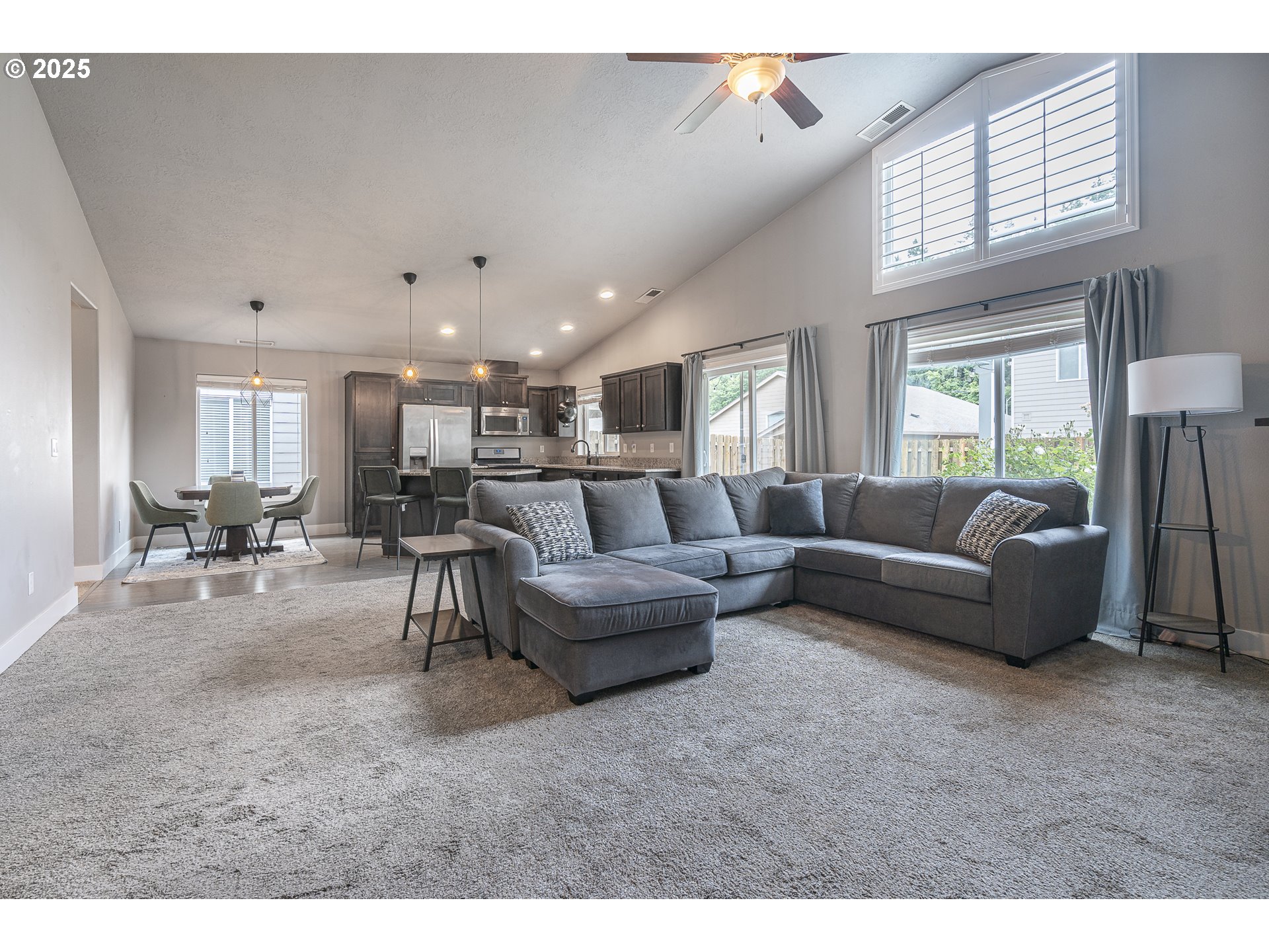 2474 Equestrian Loop South Salem, OR 97302 - Photo 8 of 23 a living room with furniture and a large window