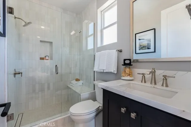 a view of a livingroom from a balcony