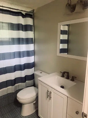a view of livingroom with furniture and a flat screen tv