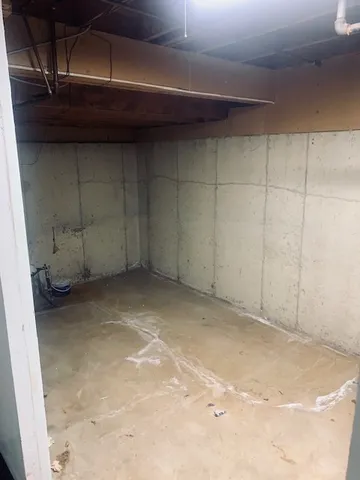 a kitchen with a sink a stove and cabinets