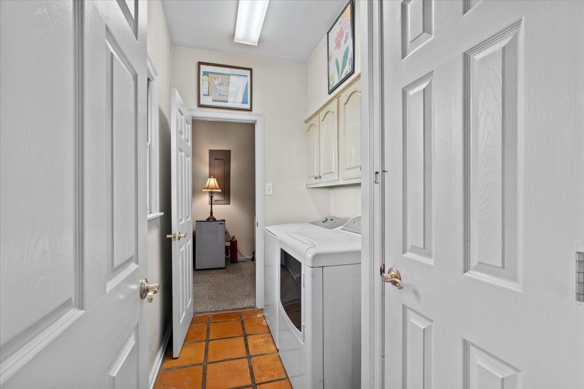 732 North Tree Drive Collierville, TN 38017 - Photo 20 of 40 Washroom with cabinet space, washing machine and dryer, and light colored carpet