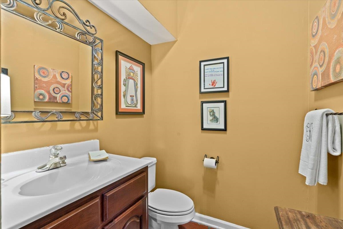 732 North Tree Drive Collierville, TN 38017 - Photo 22 of 40 Half bathroom featuring vanity and toilet