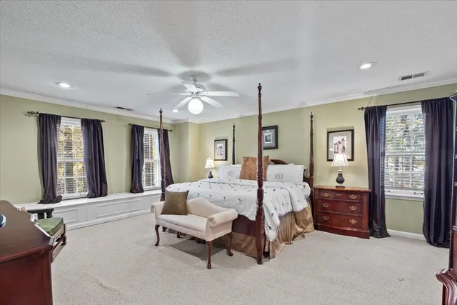 a bed room with a bed and a window