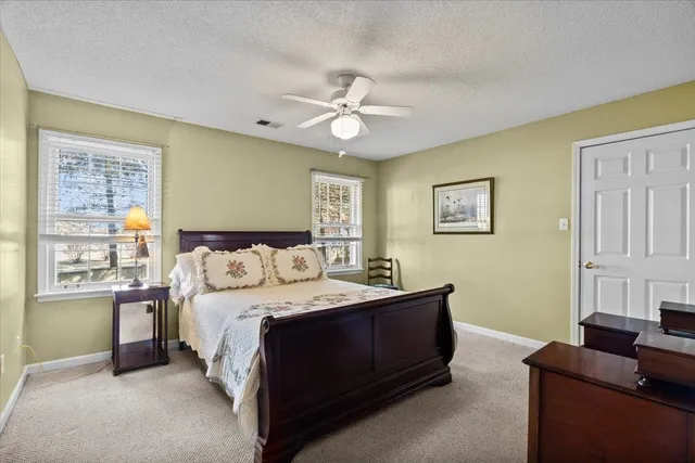 a bed room with a bed and a couch