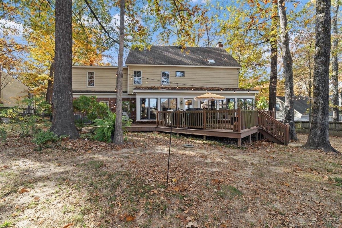 732 North Tree Drive Collierville, TN 38017 - Photo 3 of 40 Rear view of house featuring a chimney and a wooden deck