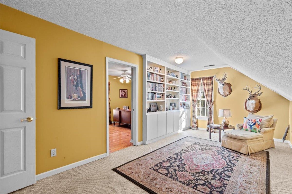 732 North Tree Drive Collierville, TN 38017 - Photo 32 of 40 Sitting room with carpet floors and a textured ceiling