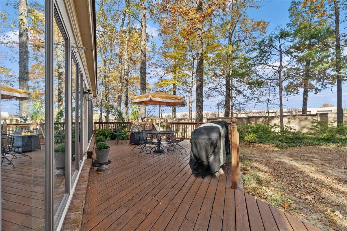 732 North Tree Drive Collierville, TN 38017 - Photo 35 of 40 Wooden deck with outdoor dining area and area for grilling