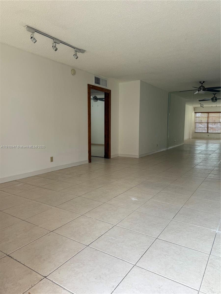 12810 Southwest 43rd Drive, Unit 115B Miami, FL 33175 - Photo 5 of 22 a view of an empty room