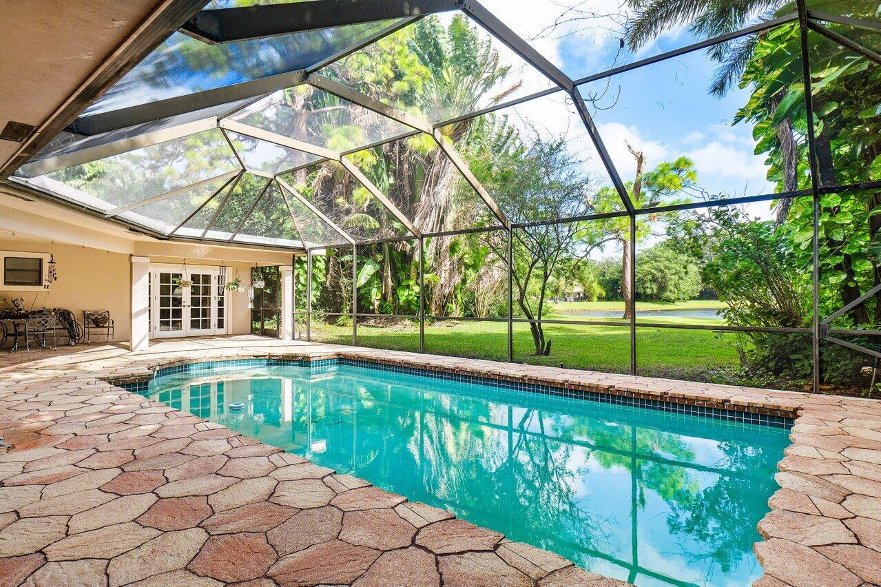 7276 Encina Lane Boca Raton, FL 33433 - Photo 23 of 34 Screened patio